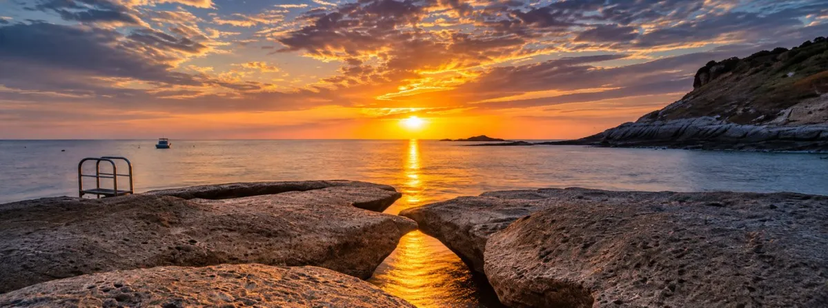 La Caleta Seafront Sunset banner